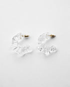 Gold‑plated stud earrings with layered sheets of transparent glass draped like ice over branches, etched with fine lines that sparkle in the light.