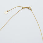 A necklace made of five connected arcs that resemble softly rounded water droplets, attached to a gold‑plated chain with an adjustable sliding ball.